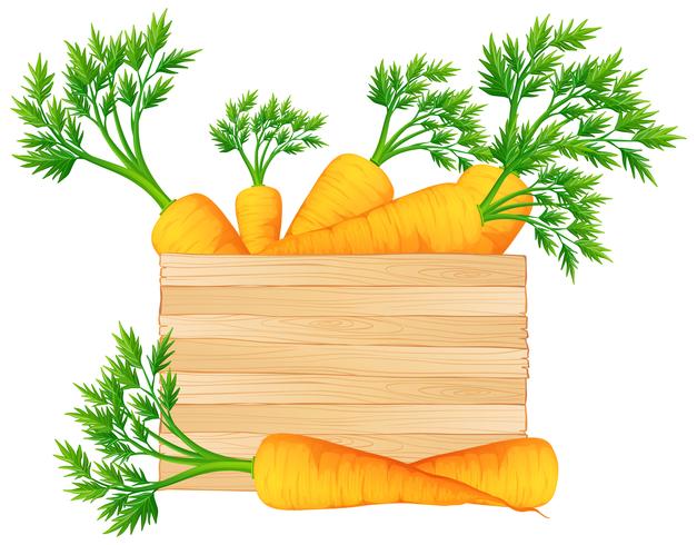 Caja de madera con zanahorias. vector