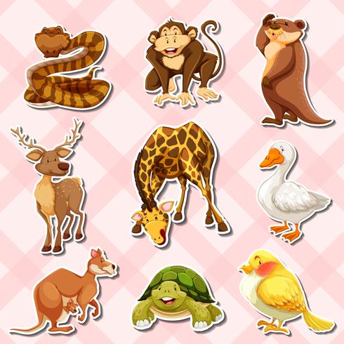 Set de pegatinas con reptiles y otros animales. vector