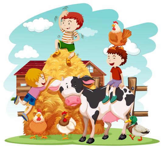 Niños jugando con animales de granja en campo vector