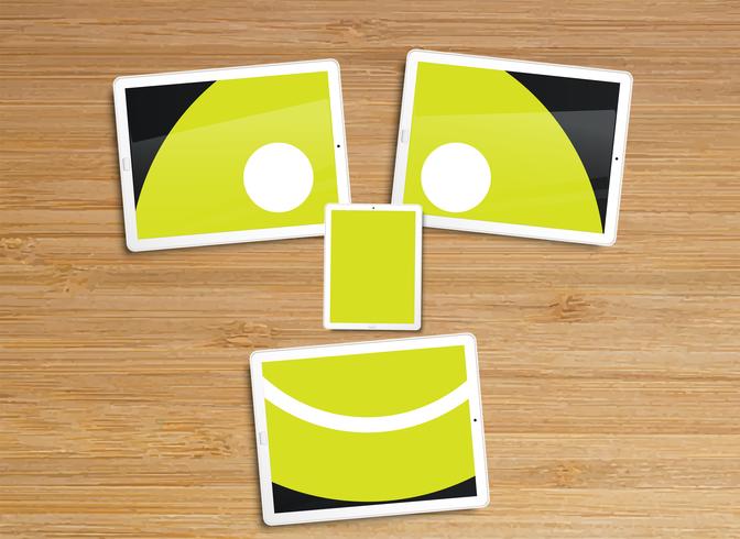 Desktop with tablets and an emoticon vector illustration