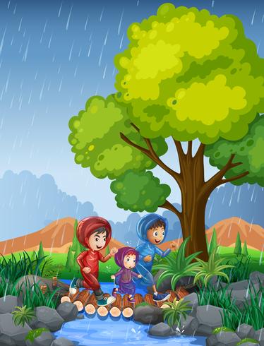 Tres niños corriendo bajo la lluvia vector