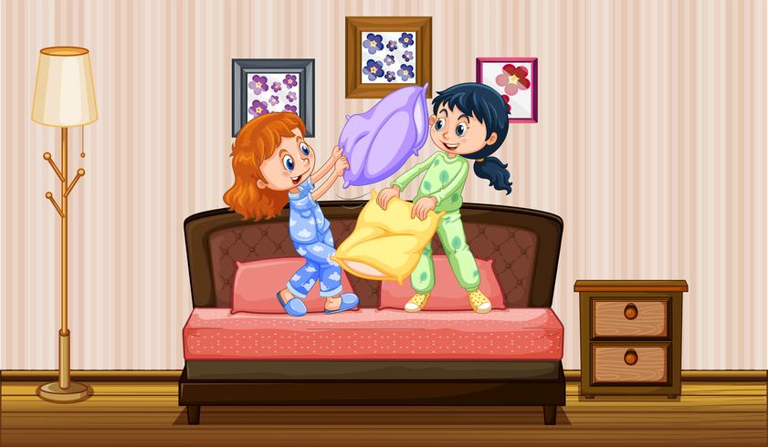 Dos niñas jugando pelea de almohadas en el dormitorio vector