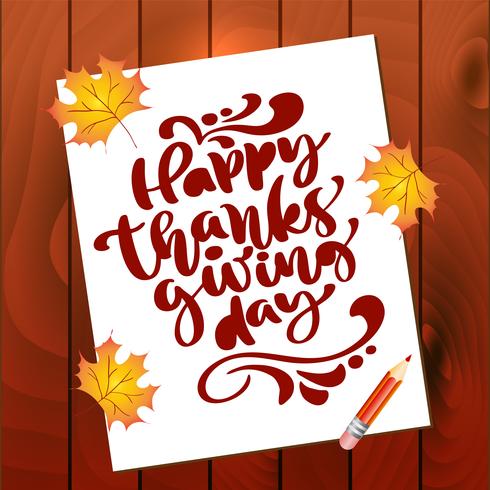 Happy Thanksgiving Day Calligraphy Text on sheet of paper with autumn leaves and wooden background. Vector Isolated Illustration. Positive lettering quote. Hand drawn modern brush for T-shirt, greeting card