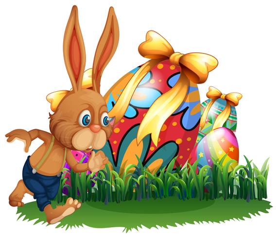 Brown bunny and easter eggs vector