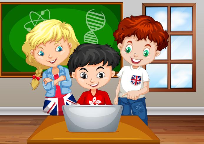 Children looking at computer in classroom vector