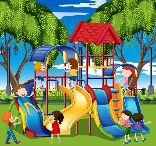 Kids play on slide at the playground vector