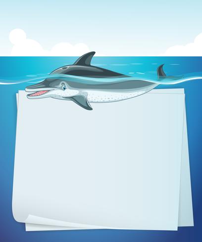 Diseño de papel con delfines en el mar. vector