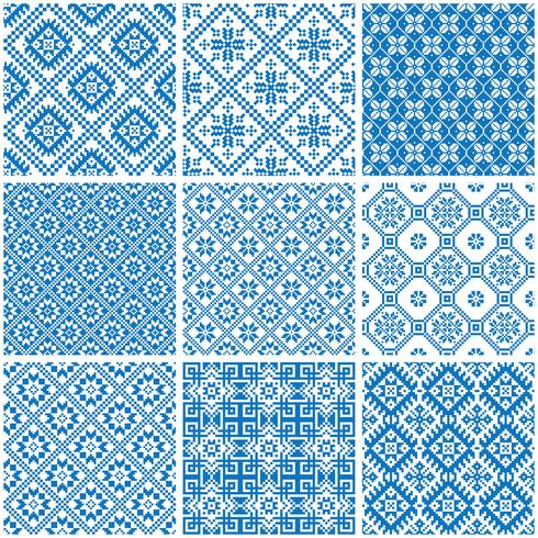blue and white ornamental ethnic seamless patterns vector