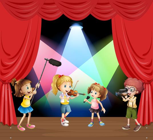 Niños interpretando música en el escenario. vector