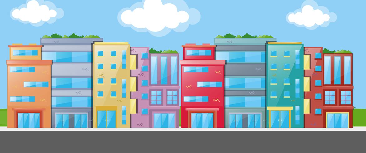 Many buildings along the road vector