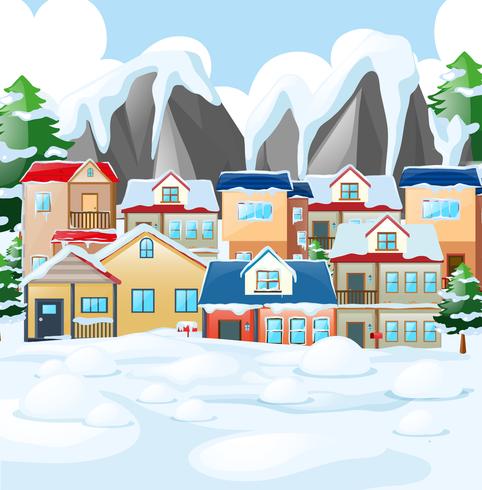 Neighborhood scene with houses covered by snow