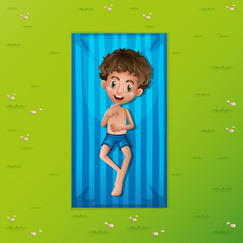 A young man relaxing on mat vector