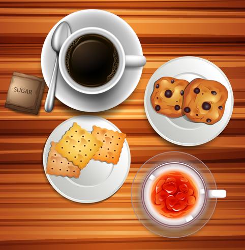 Coffee and cookies on table