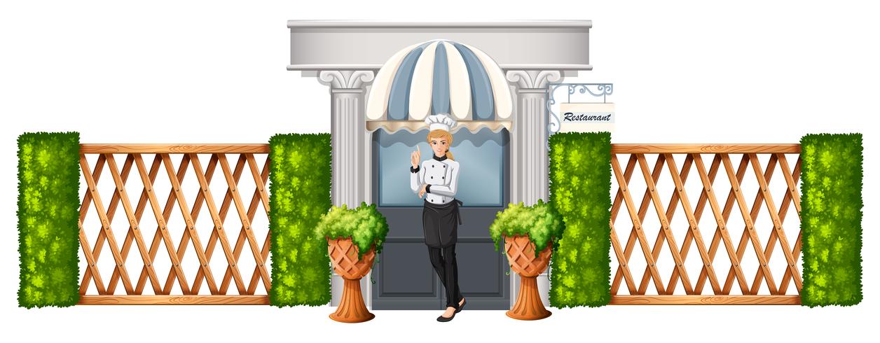 A chef in front of the restaurant with wooden fence vector