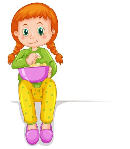 Little girl in pajamas eating popcorn vector