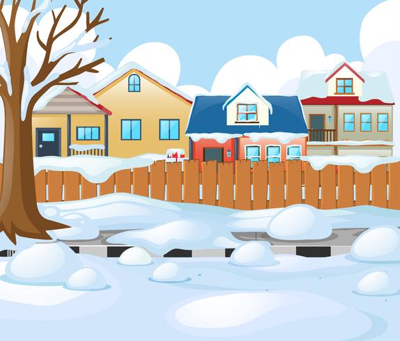 Escena de pueblo con nieve en la carretera y casas vector