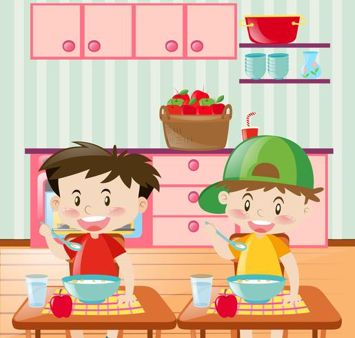 Happy boys having breakfast in kitchen vector