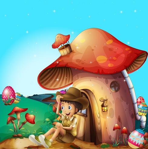 A boy at his mushroom house vector