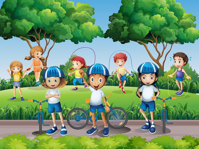 Niños haciendo ejercicio en el parque. vector