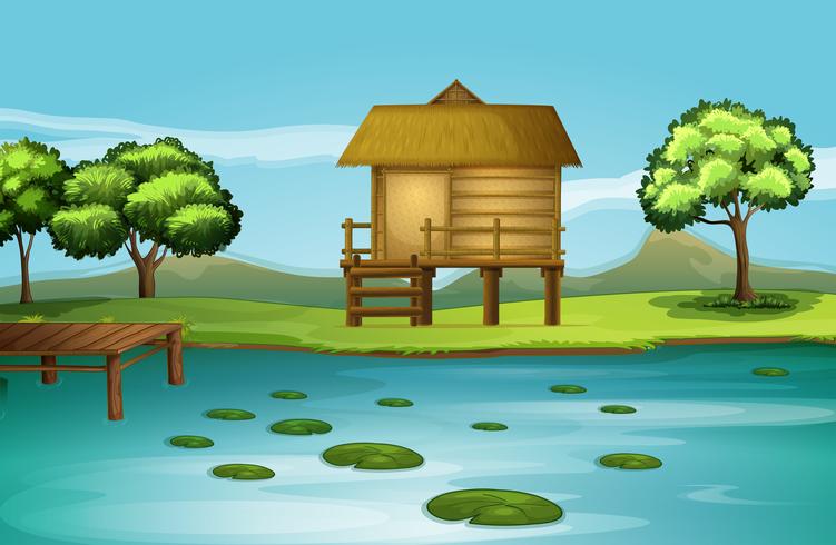 A hut at the riverbank vector