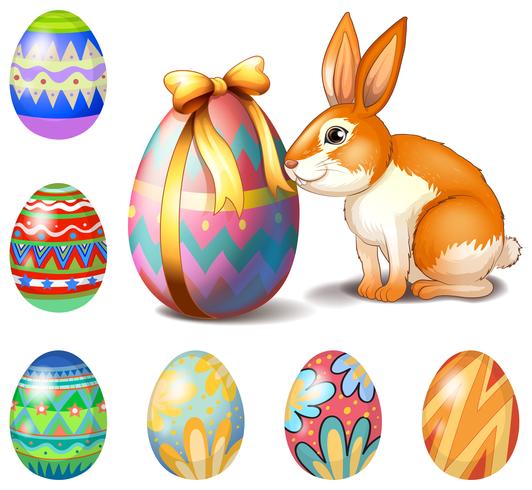 Seven Easter eggs and a bunny vector