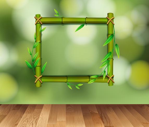 Bamboo frame on green background vector