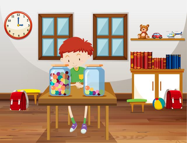 Boy and two jars with marbles in classroom vector