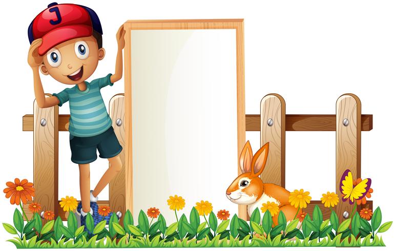 A boy holding a framed empty banner with a rabbit vector