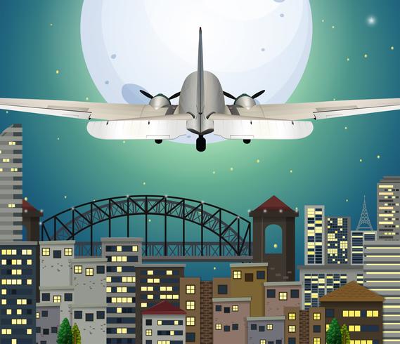 Airplane flying over urban city vector