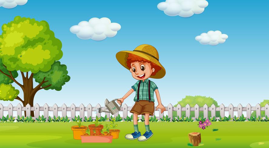 Un niño regar las plantas en el jardín vector