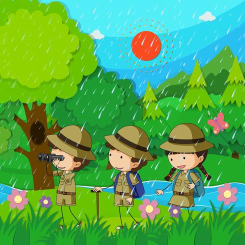 Children hiking in the rain vector