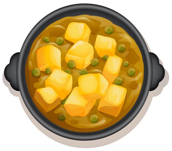 Un curry amarillo en sartén caliente vector