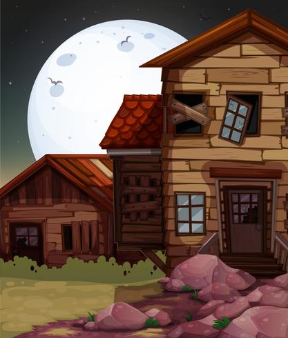 Old wooden house at night time vector