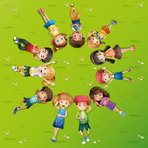 Children lying on grass in circle vector