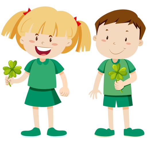 Boy and girl holding shamrocks vector