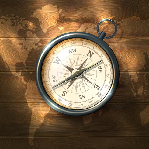Compass on wooden background vector