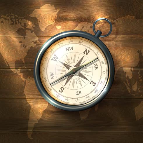 Compass on wooden background vector