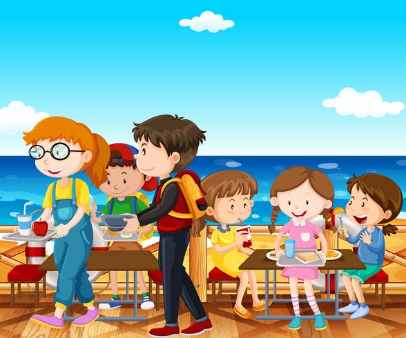 Niños almorzando junto al mar. vector