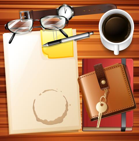 Table full of paper and other stationaries vector