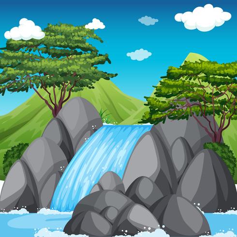 Waterfall scene with big mountains in background