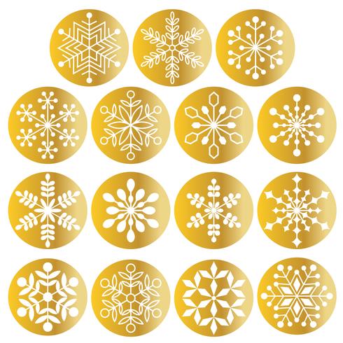 Copos de nieve blancos en círculos de oro metálico. vector