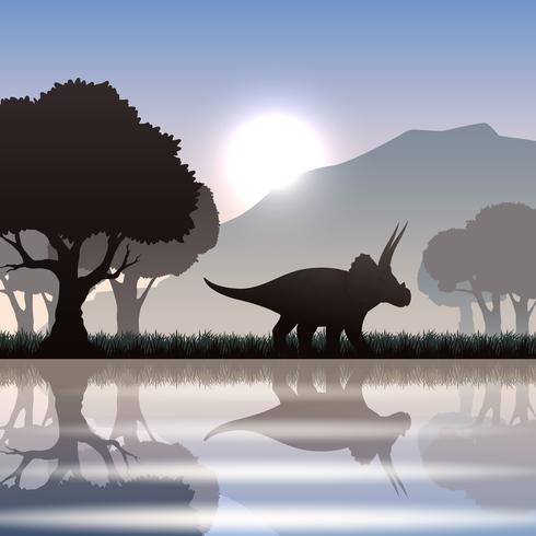 Silueta de dinosaurio en el paisaje vector