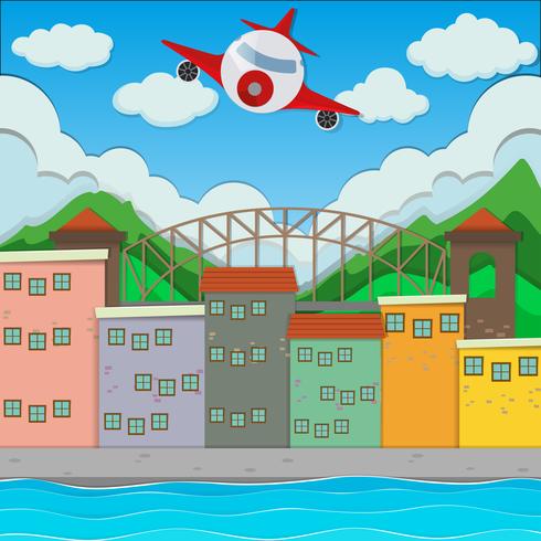 Airplane flying over the town vector