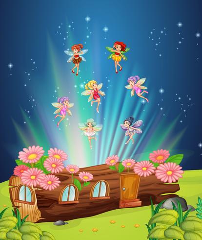 Fairies flying over the log house vector