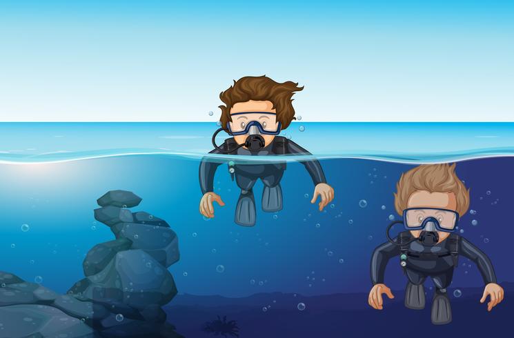 Two men diving in the ocean vector