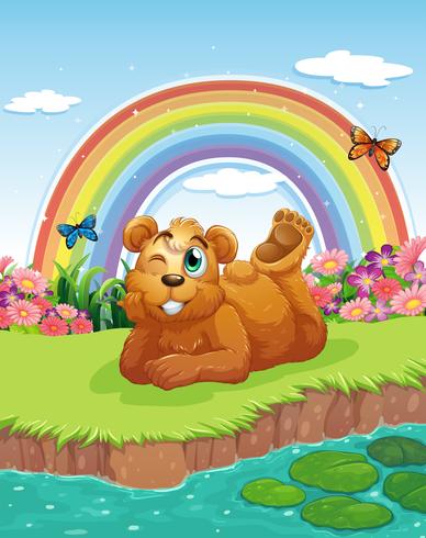 A bear at the riverbank vector