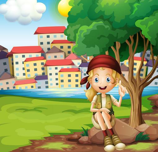 A girl sitting above the rock under the tree vector