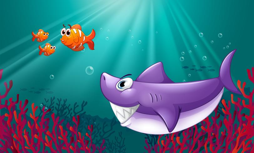 A big shark and three nemos under the sea vector