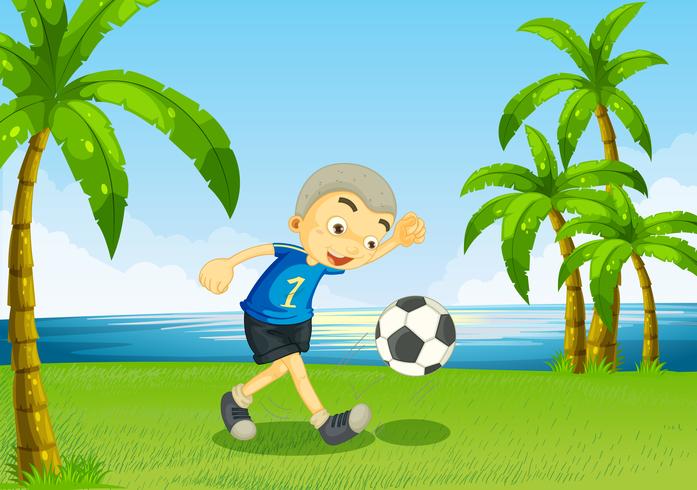 A young soccer player at the riverside with palm trees vector