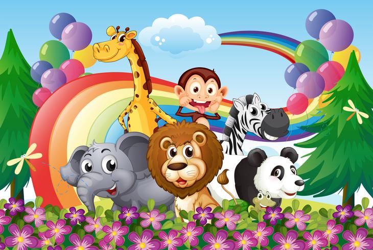 A group of animals at the hilltop with a rainbow and balloons vector